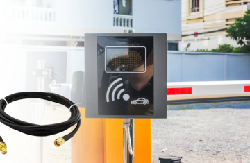 Outdoor parking lot license plate recognition and RFID access control system equipped with coaxial cables for RF equipment connection.
