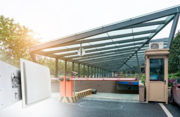 A professional UHF 12-dBi RFID Antenna ISO 18000-6C installed outdoors for long-range signal transmission and RFID tracking.