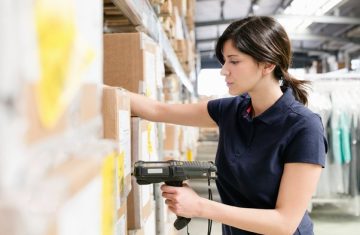 A modern automated warehouse and roll RFID inventory tags illustrating a comprehensive analysis of RFID inventory tags