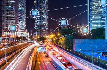 The Application of UHF Passive RFID's Long Range in the Internet of Things A modern smart city highway and IoT connectivity illustrating the application of UHF passive RFID’s long range in the Internet of Things