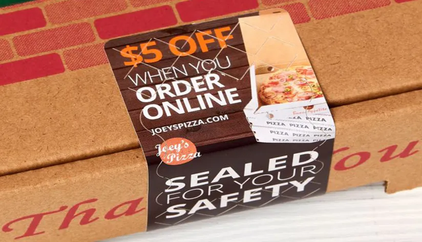 tamper-evident labels A food delivery box sealed with a tamper-evident label illustrating supply chain security and safety packaging