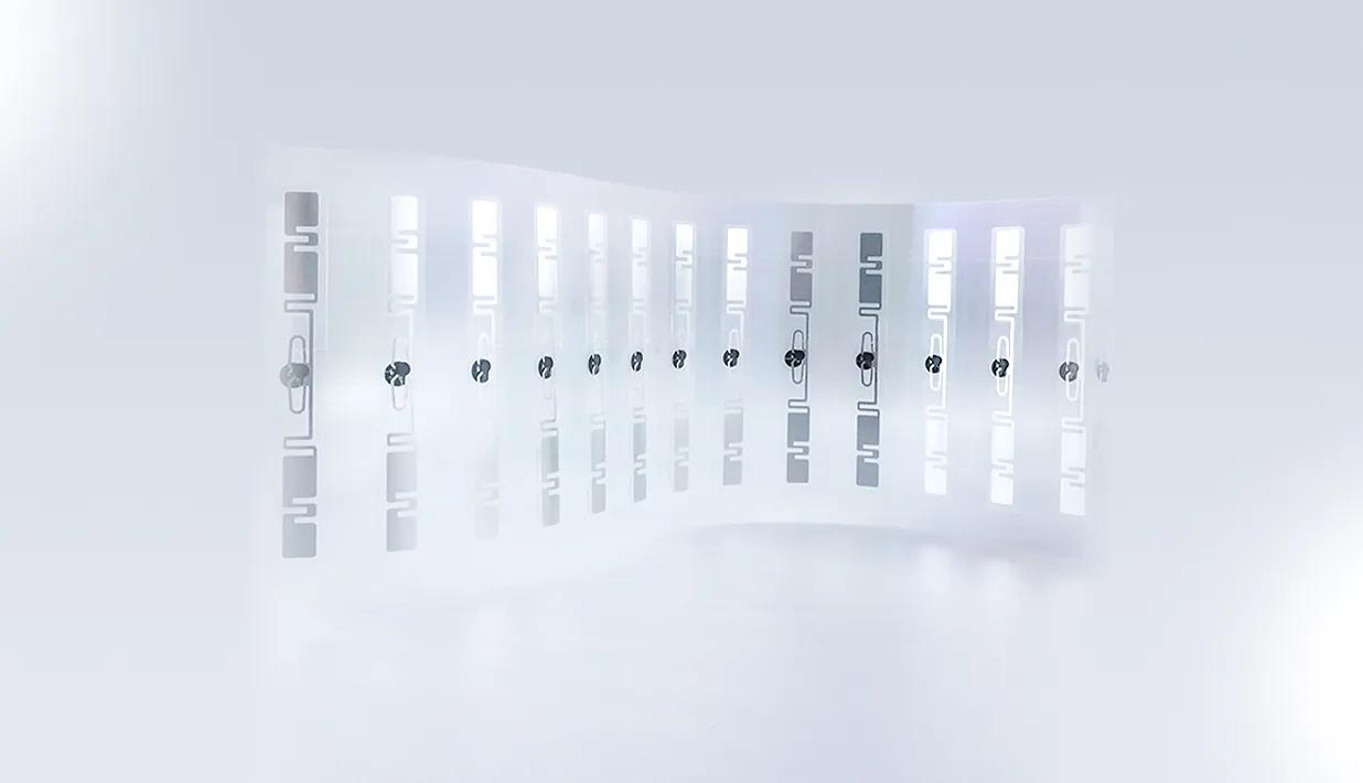 Tamper-Proof UHF RFID Headlight Label Transparent RFID stickers with antenna designs for RFID Sticker Adhesive applications.