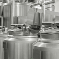Industrial Stainless Steel Tanks and Machinery in a Factory