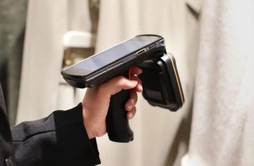 Handheld RFID Reader Being Used for Inventory Scanning