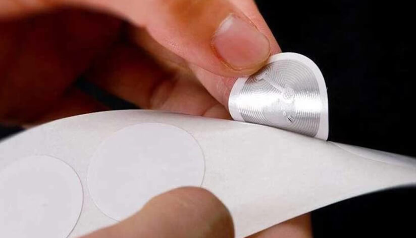 Guide of NFC tamper evident label Peeling a Circular NFC Label from Release Liner