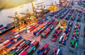 EPC Gen2v2 vs ISO 18000 6C A Logistics Scenario Compatibility Comparison An aerial view of a bustling container port terminal with colorful shipping containers and large cranes