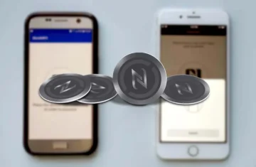 Phone Tag and NFC Revolutionizing How We Interact with Smart Devices Two smartphones with NFC tags placed near them for connection