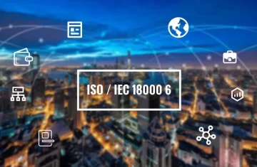 ISO/IEC 18000-6 Standard for RFID Visual representation of ISO/IEC 18000-6 standard for RFID technology with a city skyline background.