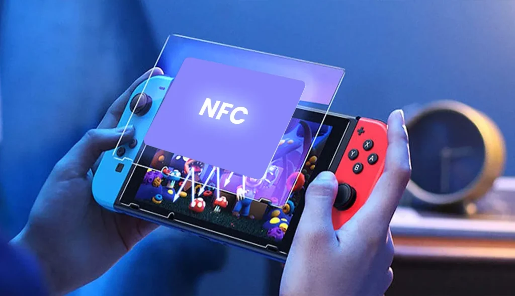 A person holding a Nintendo Switch with an NFC tag overlay visible on the screen.