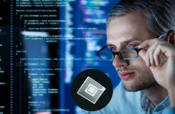 RFID Technology and Software Development A male programmer with glasses looking at computer code, with a close-up of an RFID tag floating in the foreground.