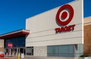 Target store exterior with red bullseye logo under a clear blue sky
